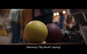 Two bowling balls side by side with the caption "Big Mouth" by Necking Playing